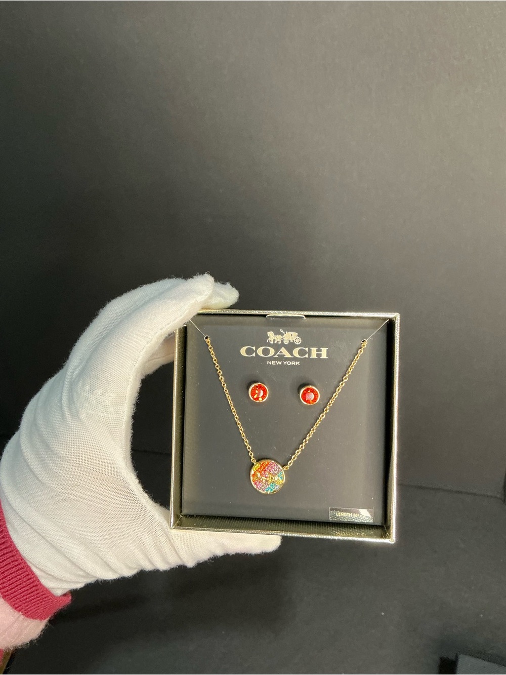 Coach Gold-Tone Necklace with Multicolor Glitter Pendant and Red Studs
